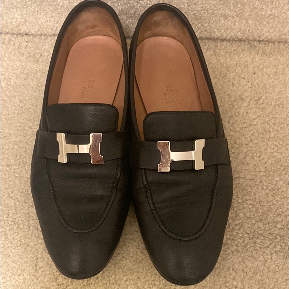 Hermes  Black Textured Leather Slip-On Loafers with Metallic Emblem